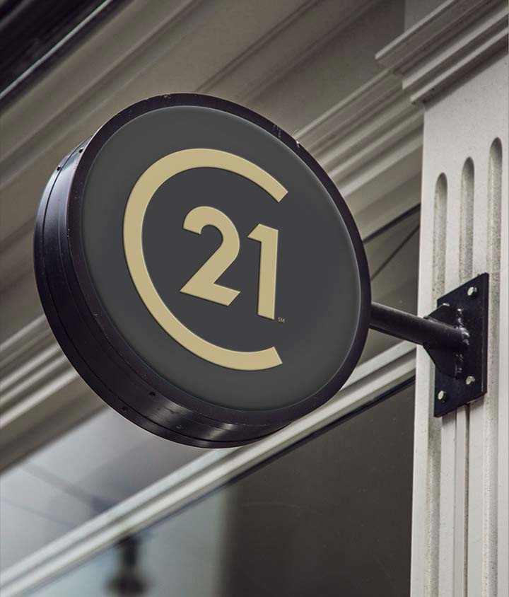 Century 21 房地產(chǎn)中介代理公司新品牌形象設(shè)計與logo設(shè)計-辦公室圓版標(biāo)志效果 Century 21 房地產(chǎn)中介代理公司新品牌形象設(shè)計與logo設(shè)計-辦公室圓版標(biāo)志效果