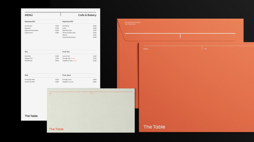 The Table 電信品牌vi視覺識別設計空間設計及導視，與桌子結(jié)合的長長的T型水平線元素